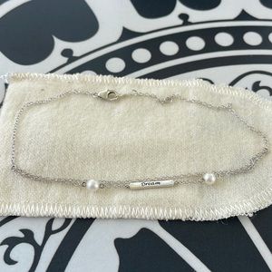 10kt white gold 9” anklet bracelet. Has a adjustable round link ..DREAM on it!